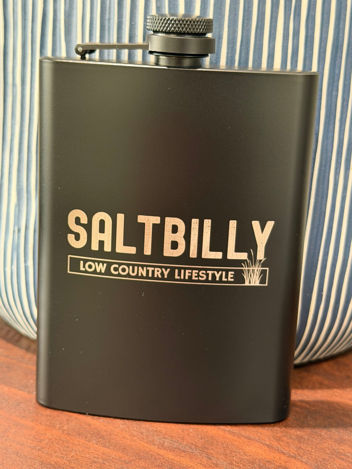 Matte black 8 oz hip flask laser engraved with the Saltbilly Low Country Lifestyle logo