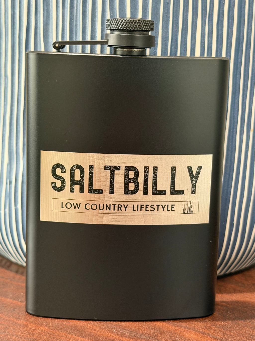 Matte black 8 oz hip flask with a full rectangular engraved panel featuring the Saltbilly logo